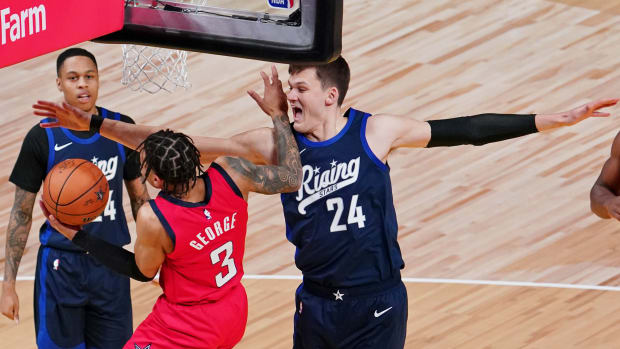  Feb 16, 2024; Indianapolis, Indiana, USA; Team Jalen center Walker Kessler (24) of the Utah Jazz blocks the shot of Team Tamika guard Keyonte George (3) of the Utah Jazz during a Rising Stars semifinal game at Gainbridge Fieldhouse. Mandatory Credit: Kyle Terada-USA TODAY Sports